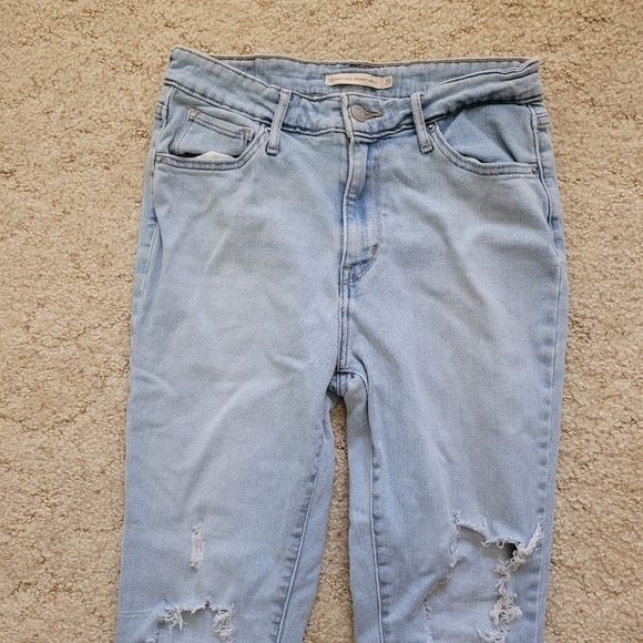 721 High Rise Skinny Light Wash Distressed Jeans - Picture 4 of 6